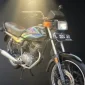 Gambar Oil Cooler Telah Diteliti dan Dinyatakan Mempengaruhi Temperatur Mesin GL Max 100 (Sumber; Canva)