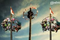 Gambar Panjat Pinang, Lomba Agutusan Yang Ternyata Produk Kolonial (Sumber: Canva)