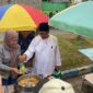 Wabup Jember saat kunjungan ke Bazar UMKM (Sumber foto: Sigit Gita Pamuji)
