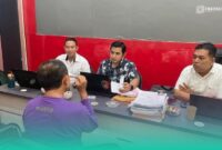 Sekretaris Desa Tanggul Wetan, inisial Z, di hadapan SPKT Polres Jember. (Foto: Istimewa).