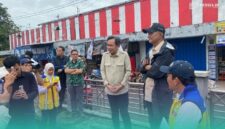 Bupati Jember, Muhammad Fawait bersama Menteri Pekerjaan Umum, Dody Hanggodo, saat meninjau lahan pembangunan fly over di simpang empat Mangli. (Foto: Sigit/Frensia). 