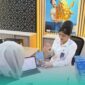 Teller Bank BRI saat melayani nasabah yang akan menabung emas (Foto: Havana Haniva untuk Frensia). 