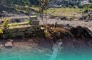 Penampakan makam yang terkena alat berat galian C (Foto: Istimewa). 