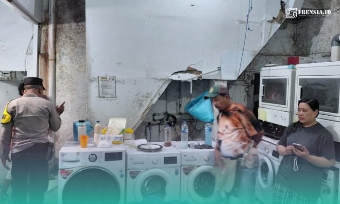Pihak kepolisian saat melakukan olah TKP di tempat 