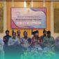Jajaran Forkopimda Kabupaten Jember bersama Bupati Jember, Muhammad Fawait (tengah, pegang mikrofon), saat agenda Rapat Konsolidasi dan Penataan Pasar Tanjung di Graha Dinas Pendidikan Jember. (Foto: Fadli/Frensia). 